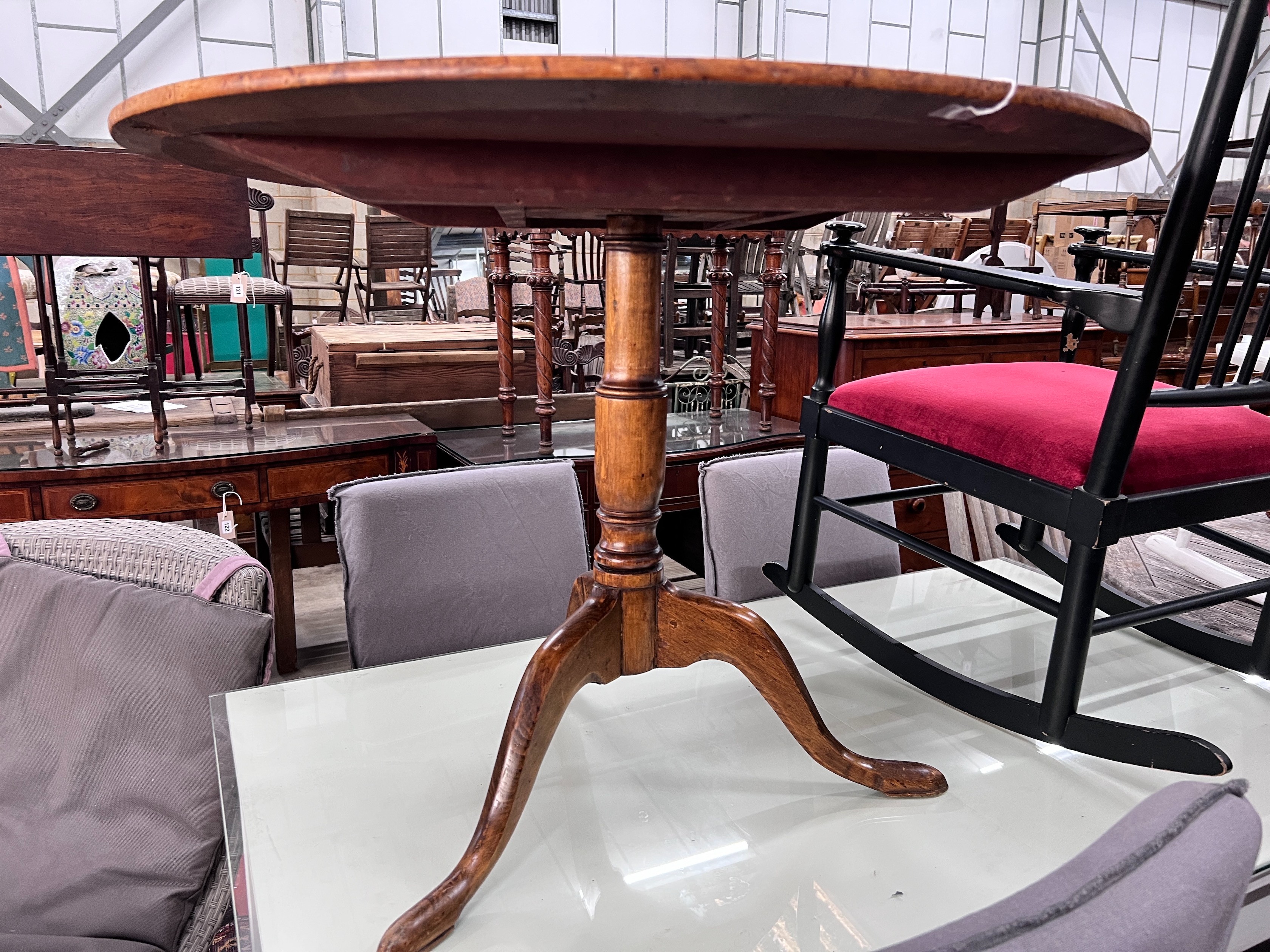 A George III bird's eye maple circular tilt top tripod tea table, diameter 88cm, height 67cm *Please note the sale commences at 9am.